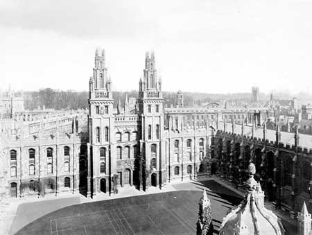 A black and white photograph of the Great Quad at All Souls College with tennis courts marked on the grass