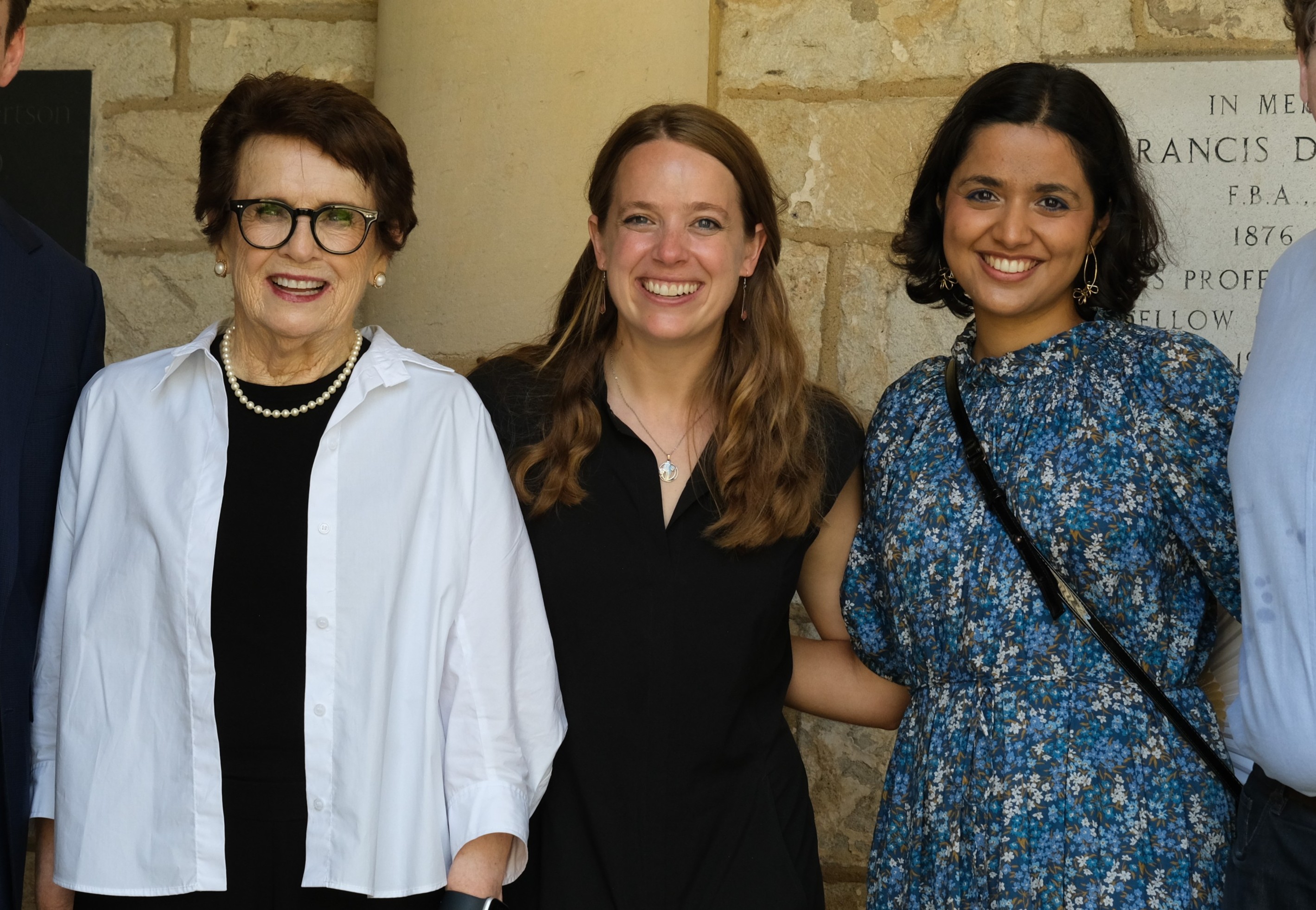 Billie Jean King standing next to All Souls Fellows, Meredith Paker and Mrinalini Sisodia Wadhwa