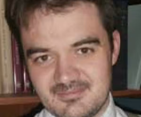 Dr Justin Stover