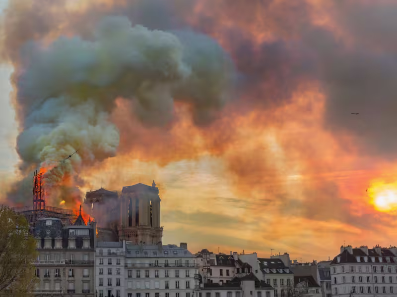 Skyline with clouds of smoke from Notre Dame fire.